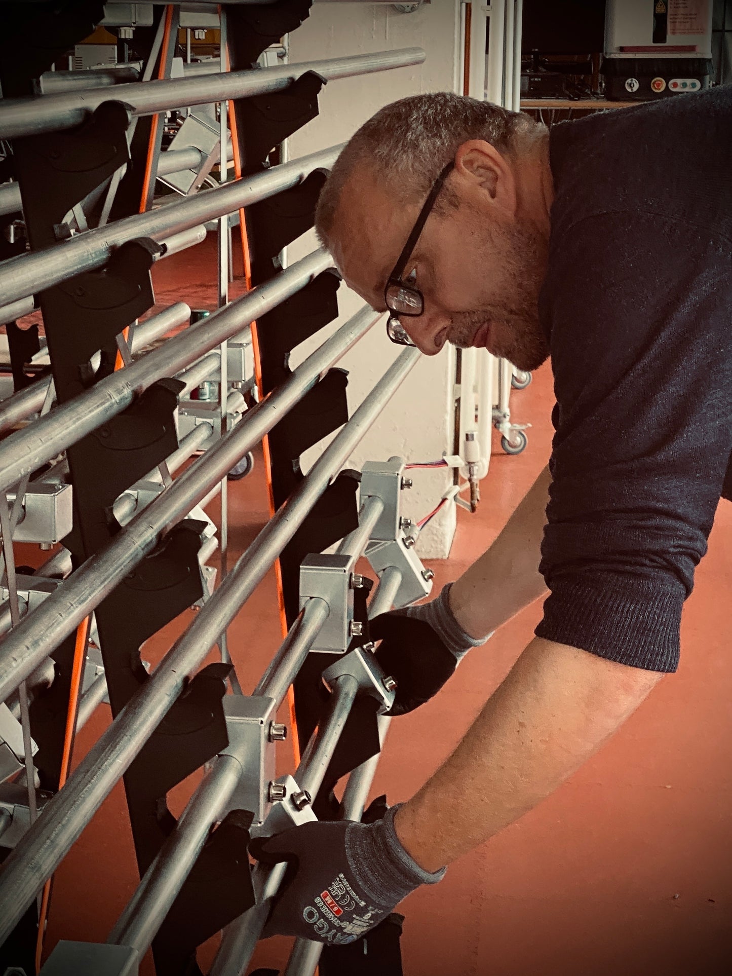 Factorylux Track-Pipe during assembly process at factory in West Yorkshire, UK