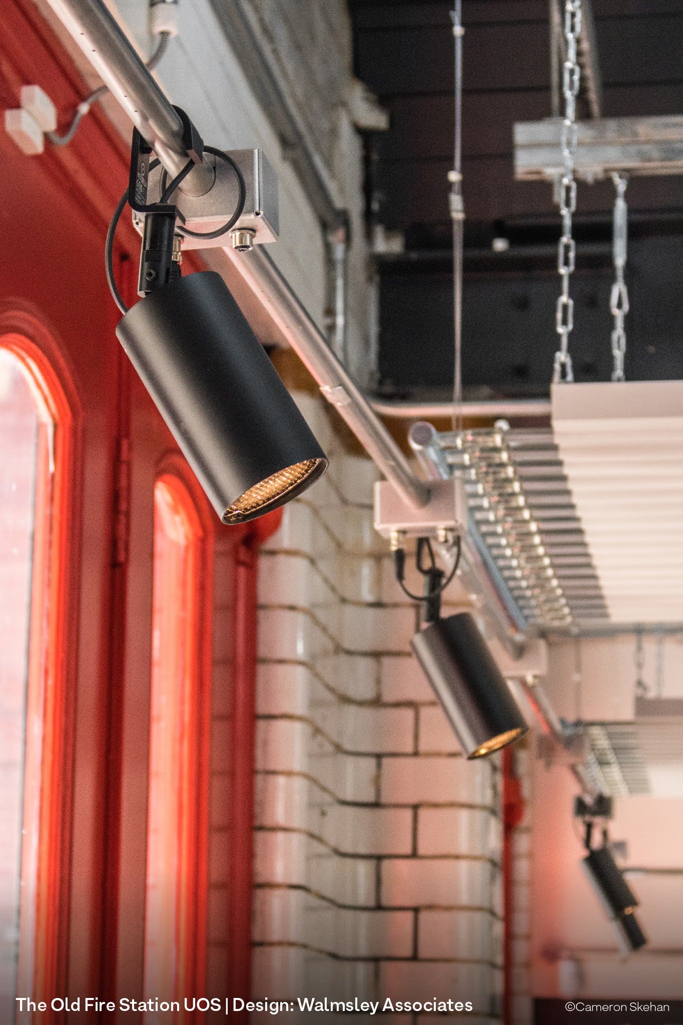 Conservation interior at The Old Fire Station Cafe bar in Salford with architectural pendant ights and spotlights.