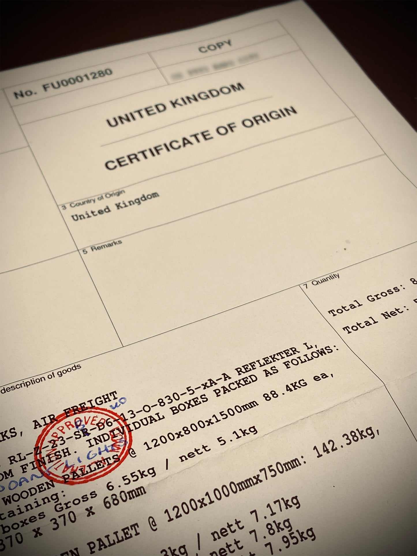Stamped and signed Certificate of Origin, required by customs authorities of the importing country