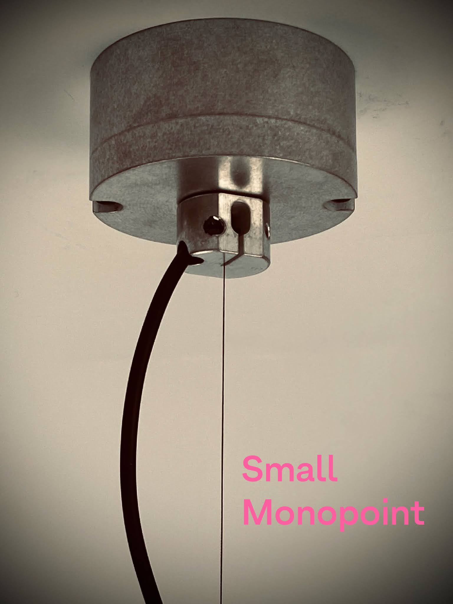 Installed small monopoint for a budget architectural pendant that was designed for circular economy