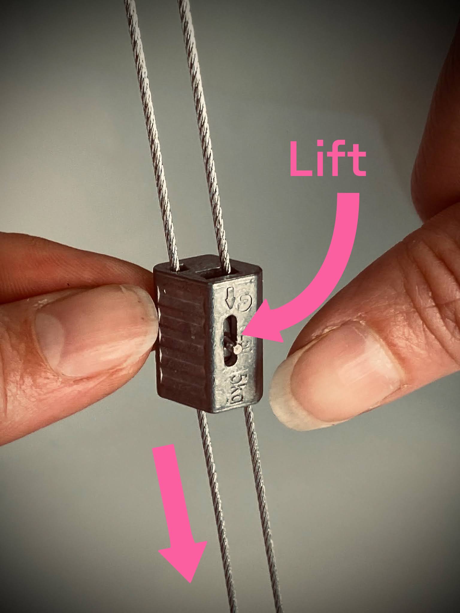 Illustration of suspension wire adjustment for architectural pendant light that's designed for circular economy