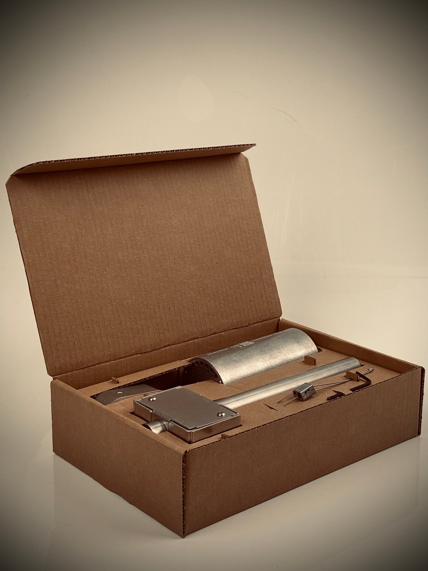 Factorylux Track-Pipe and Ninety-Nine spotlight sample pack, presented in recycled cardboard packaging